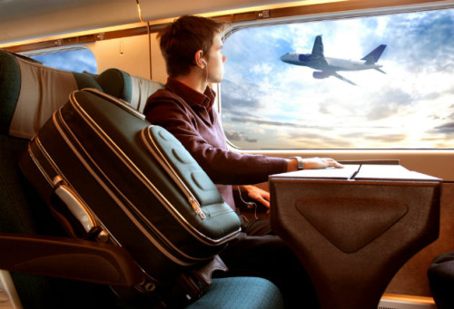 Student looking out from a plane, embarking on education abroad