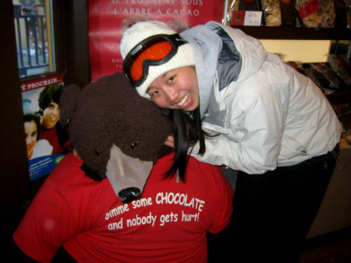 Liv Yoon hugging a giant teddy bear