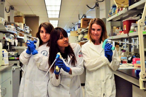 Nayara Vanessa dos Santos Gomes poses with her internship colleagues at Tanz Centre for Research 