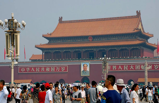 Tiananmen Square, Beijing, with the portrait of Mao Zedong in the background